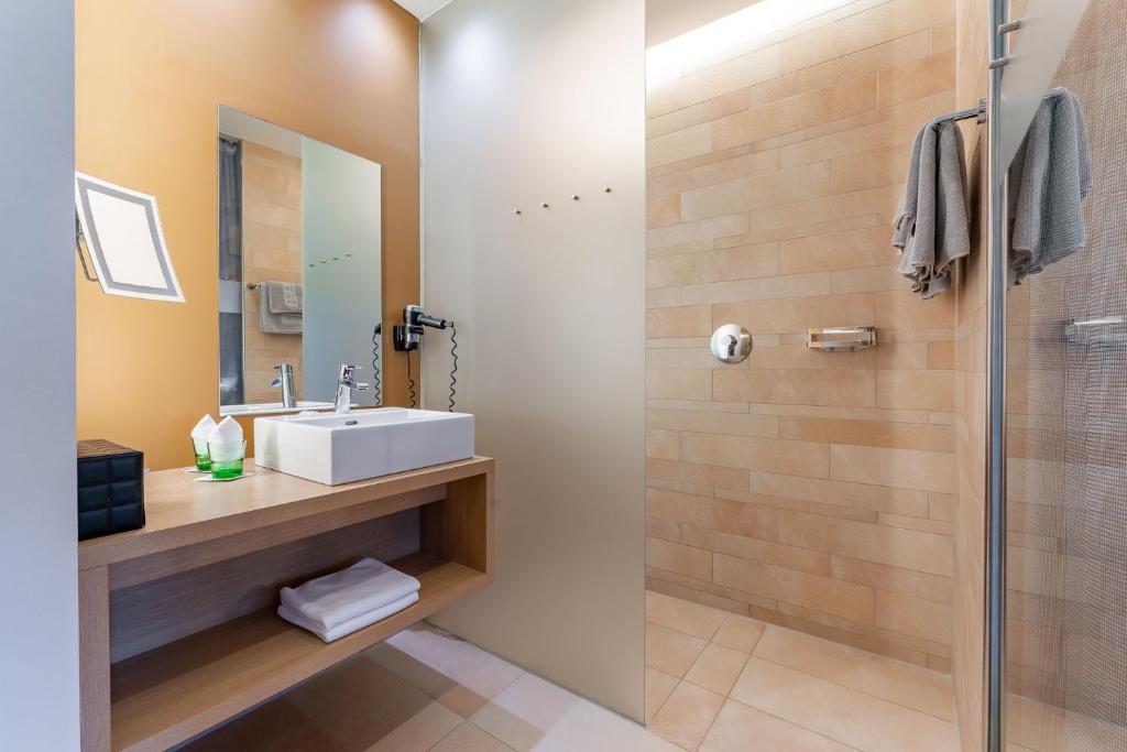 Koupelna v ubytování Ritzenhof - Hotel und Spa am See 4-Sterne-Superior