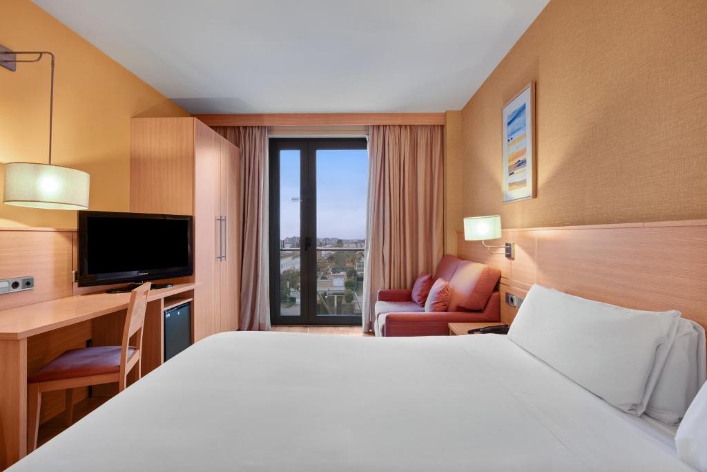 Postel nebo postele na pokoji v ubytování B&B HOTEL Tarragona Valls