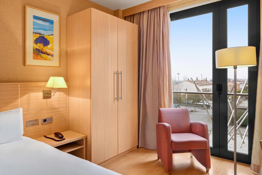 Postel nebo postele na pokoji v ubytování B&B HOTEL Tarragona Valls