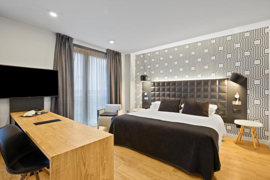 TV a/nebo společenská místnost v ubytování B&B HOTEL Tarragona Valls
