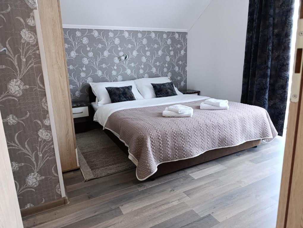 Posteľ alebo postele v izbe v ubytovaní Guest House Toic