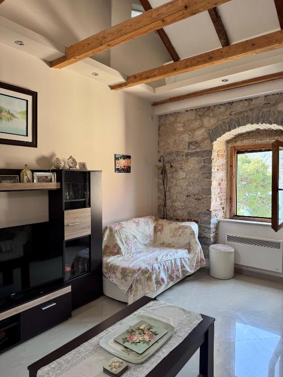 Postel nebo postele na pokoji v ubytování Tetka Apartments