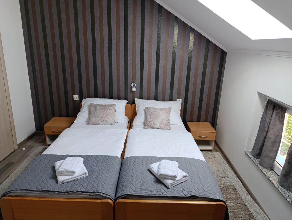 Posteľ alebo postele v izbe v ubytovaní Guest House Toic