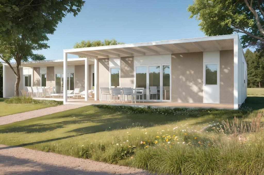 a rendering of a house with a garden at Villaggio San Francesco in Duna Verde