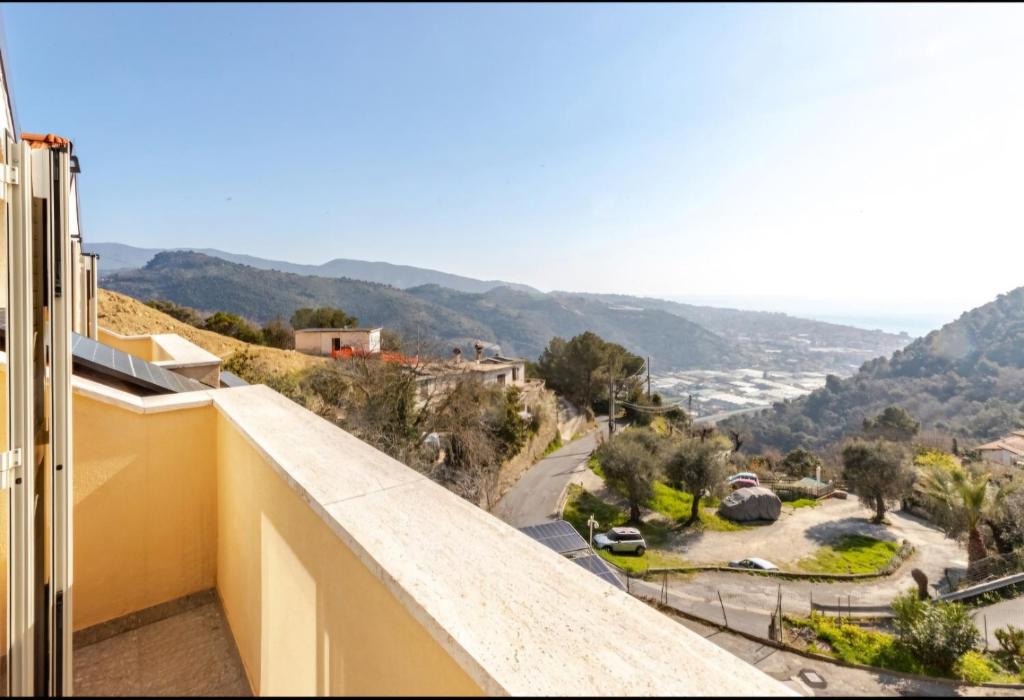 a view from the balcony of a house at Casetta Panorama - Vista mare panoramica 2 camere relax in Camporosso