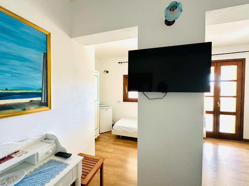 TV a/nebo společenská místnost v ubytování B&B Tre - Rooms & Relax