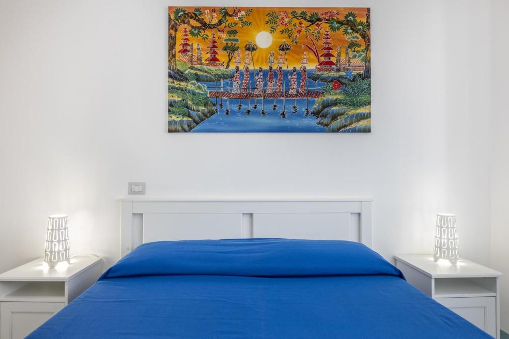 Postel nebo postele na pokoji v ubytování Le camere di Riva delle donne by Vivimy