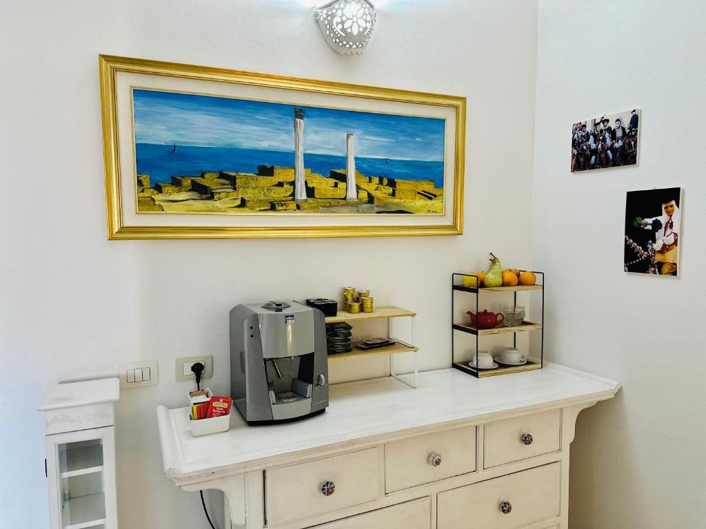Příslušenství pro přípravu čaje a kávy v ubytování B&B Tre - Rooms & Relax