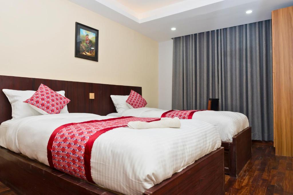 Postel nebo postele na pokoji v ubytování Rightway Hotel & Restaurant