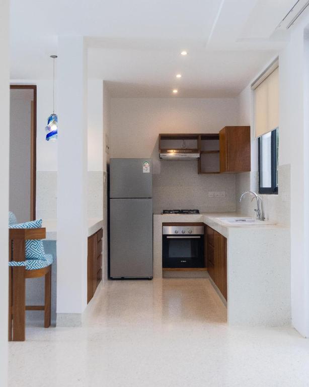 Kuchyň nebo kuchyňský kout v ubytování Amkia Villas Diani