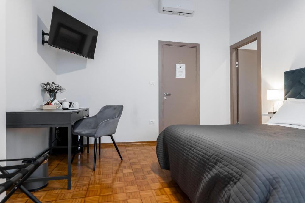 Postel nebo postele na pokoji v ubytování Casa Arnaldo