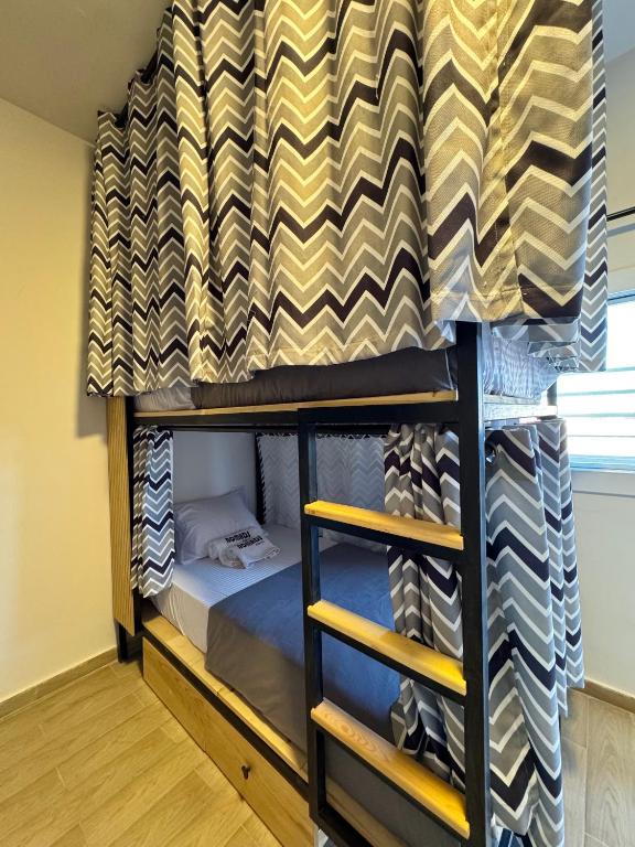 Postel nebo postele na pokoji v ubytování Nomads Hostel