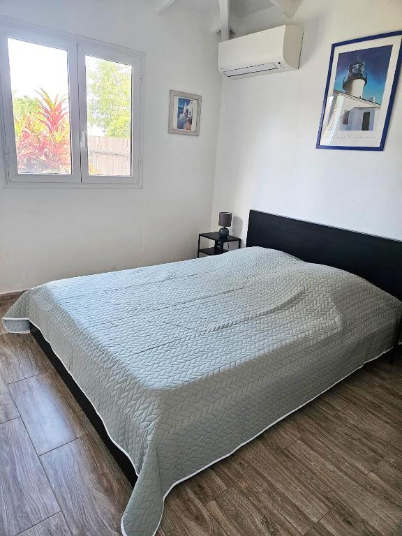 Postel nebo postele na pokoji v ubytování Villa Marissea
