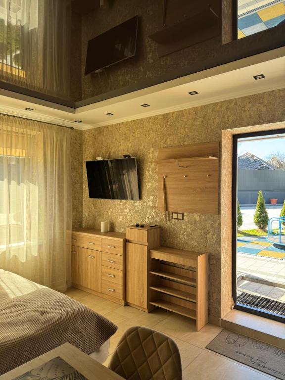 TV a/nebo společenská místnost v ubytování Guest Apart Polyana