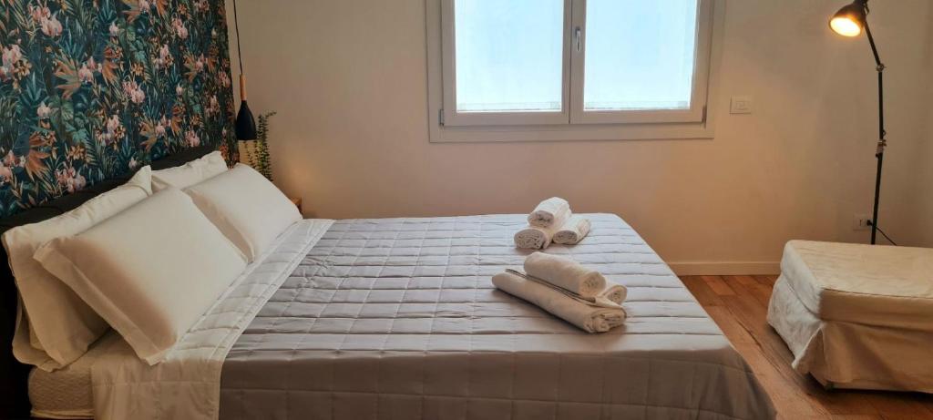 Postel nebo postele na pokoji v ubytování Garda Lake Harmony