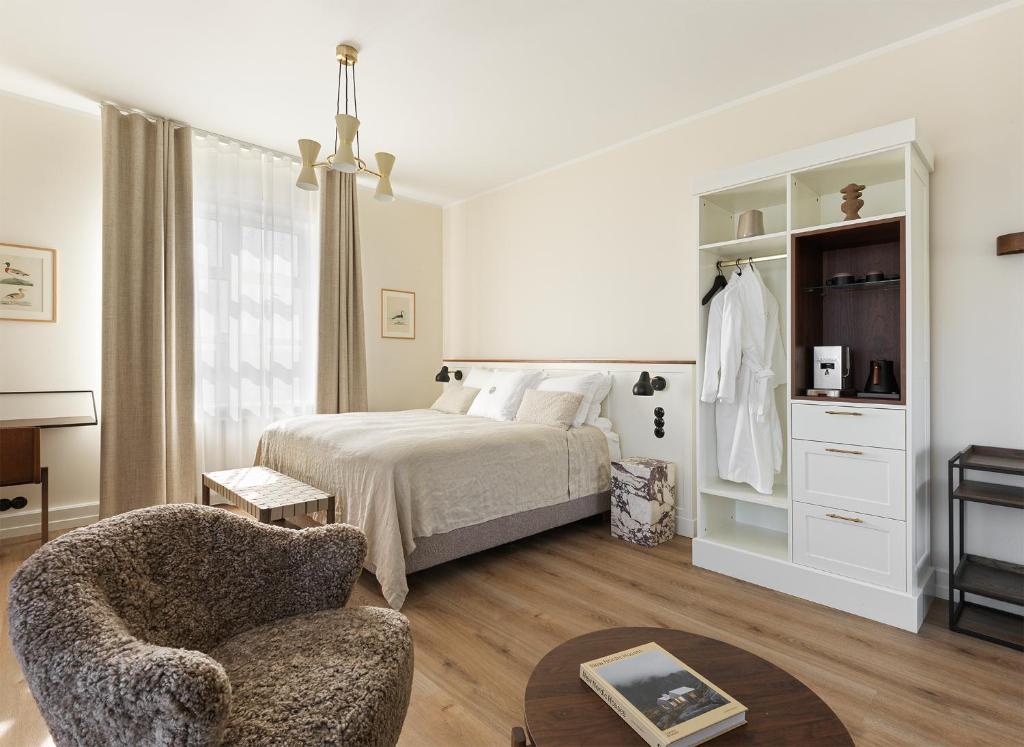 Posteľ alebo postele v izbe v ubytovaní Hotel Búdir