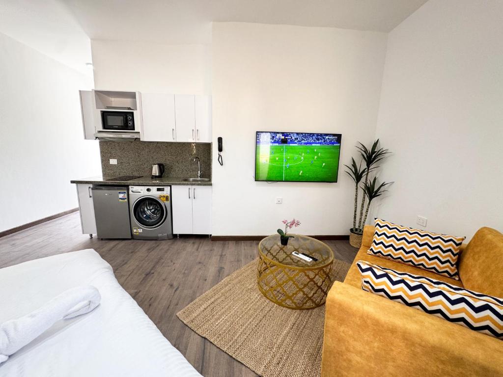 Kuchyň nebo kuchyňský kout v ubytování Arаbian Suites by Imperial