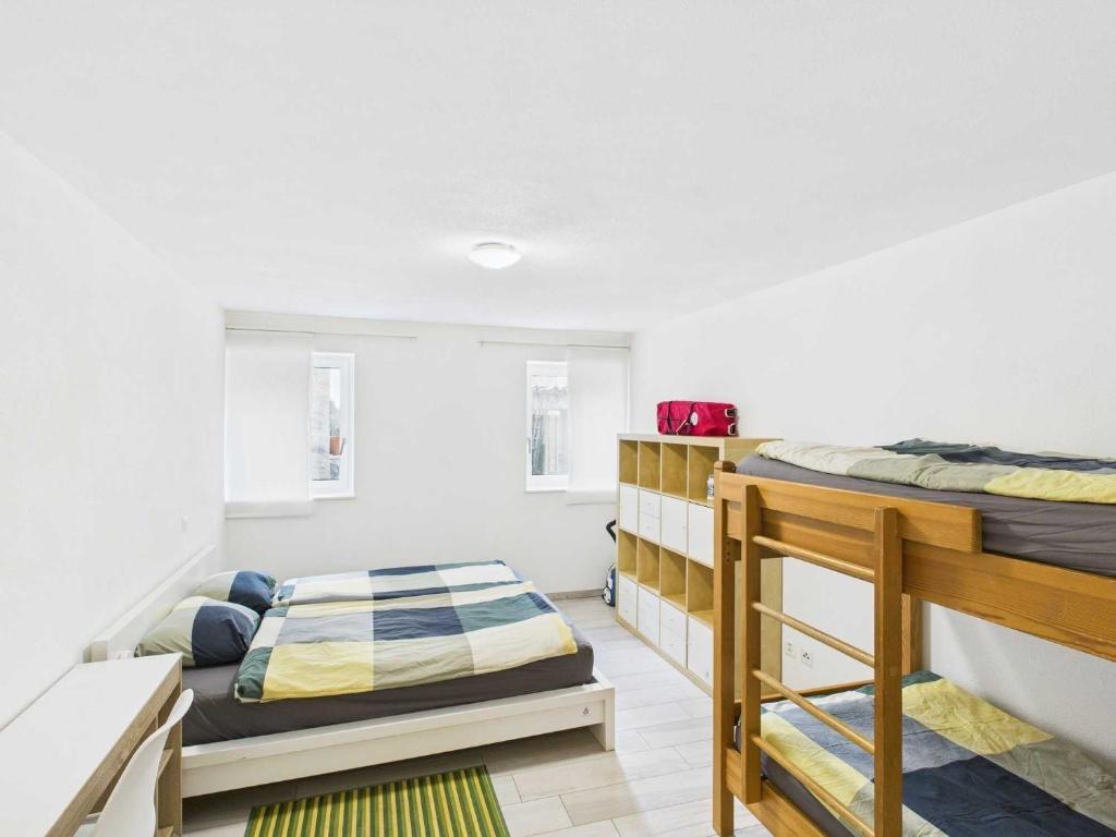 Postel nebo postele na pokoji v ubytování Sonvico Court House Charming Lodge in Lugano