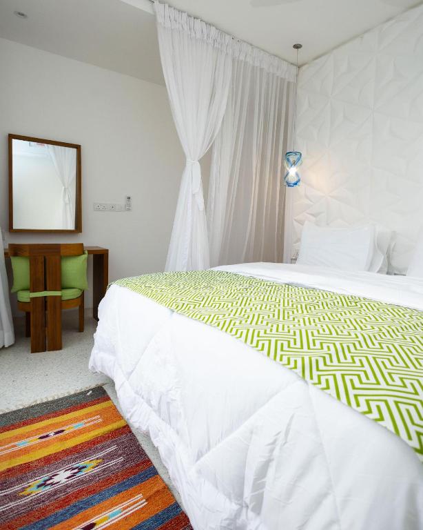 Postel nebo postele na pokoji v ubytování Amkia Villas Diani