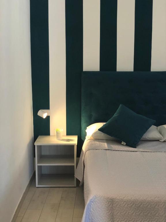 Postel nebo postele na pokoji v ubytování Affitti Brevi SCALA DEI TURCHI