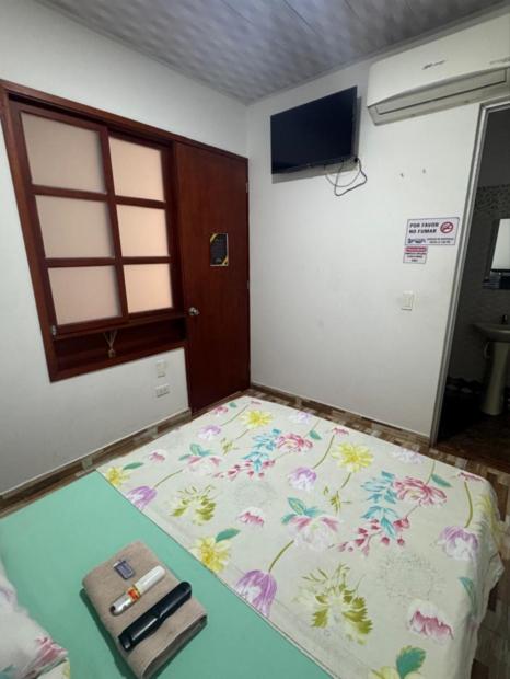 Postel nebo postele na pokoji v ubytování Hotel la 21