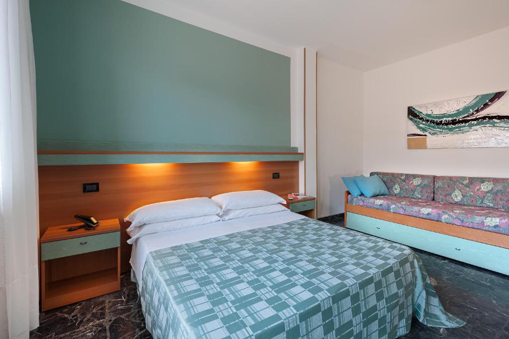 Postel nebo postele na pokoji v ubytování Hotel Europeo