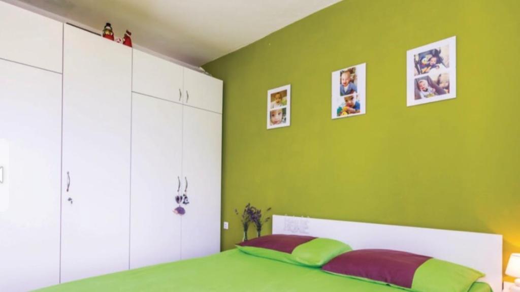 Posteľ alebo postele v izbe v ubytovaní Apartment Gina