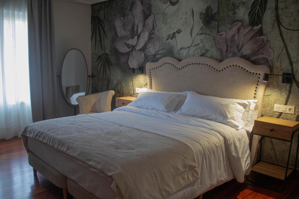 Postel nebo postele na pokoji v ubytování Hotel Bermeo