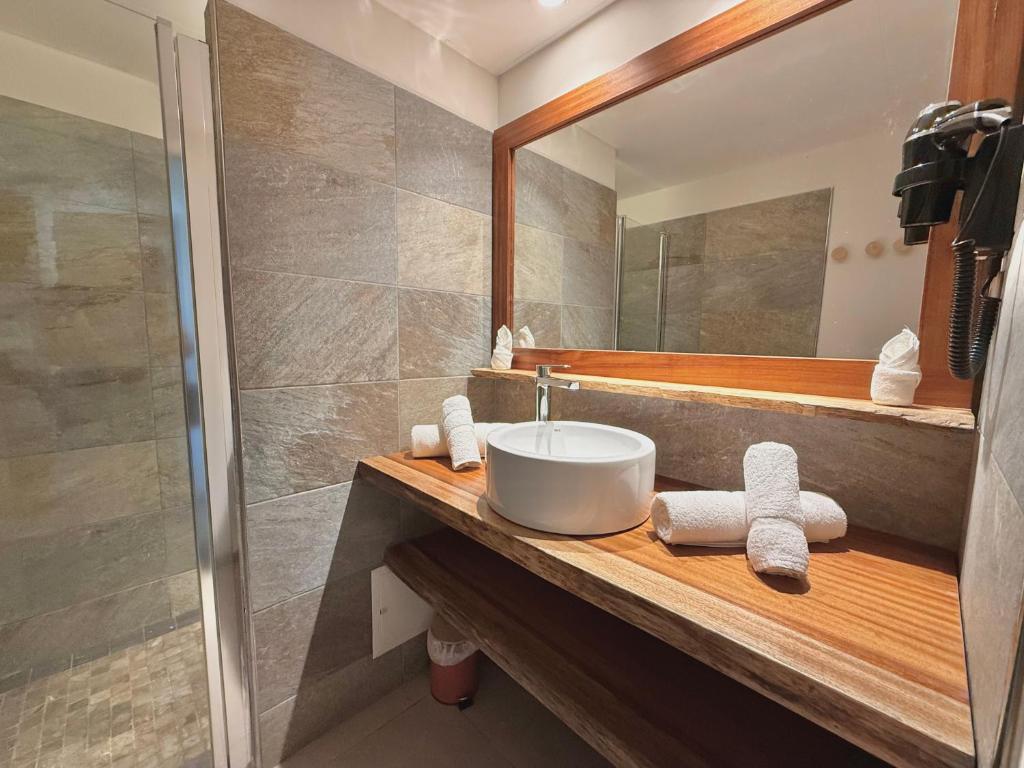 Koupelna v ubytování Courbaril Hôtel