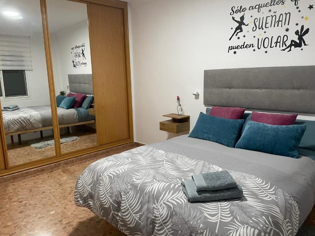 Posteľ alebo postele v izbe v ubytovaní Palacio de Ferias apartamento