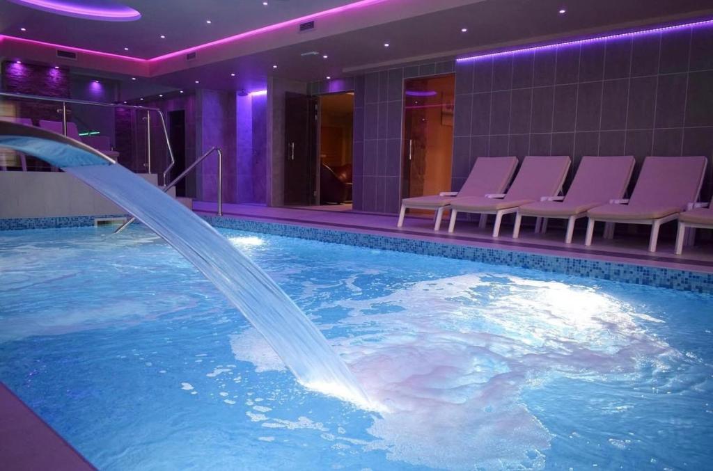 Bazén v ubytování Wellness & Spa - Hotel Oaza nebo v jeho okolí
