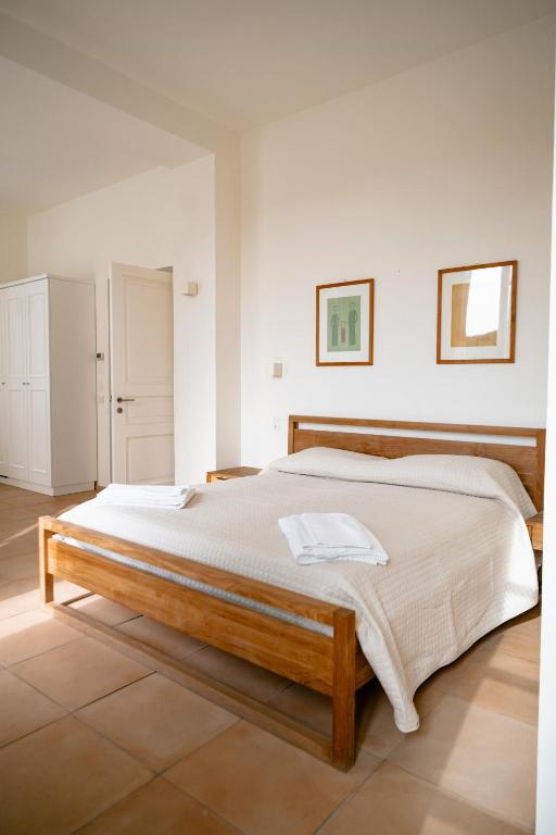 Postel nebo postele na pokoji v ubytování Tenuta Calitto wine resort e spa