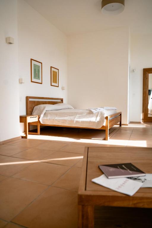 Postel nebo postele na pokoji v ubytování Tenuta Calitto wine resort e spa