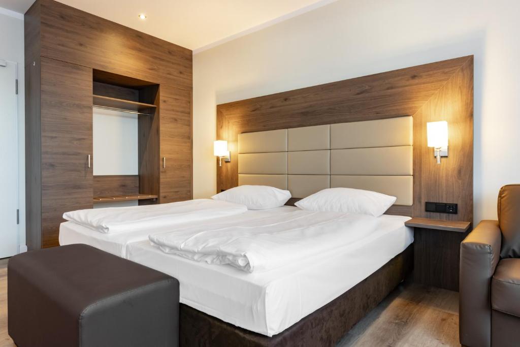 Postel nebo postele na pokoji v ubytování Hotel Ohlenhoff