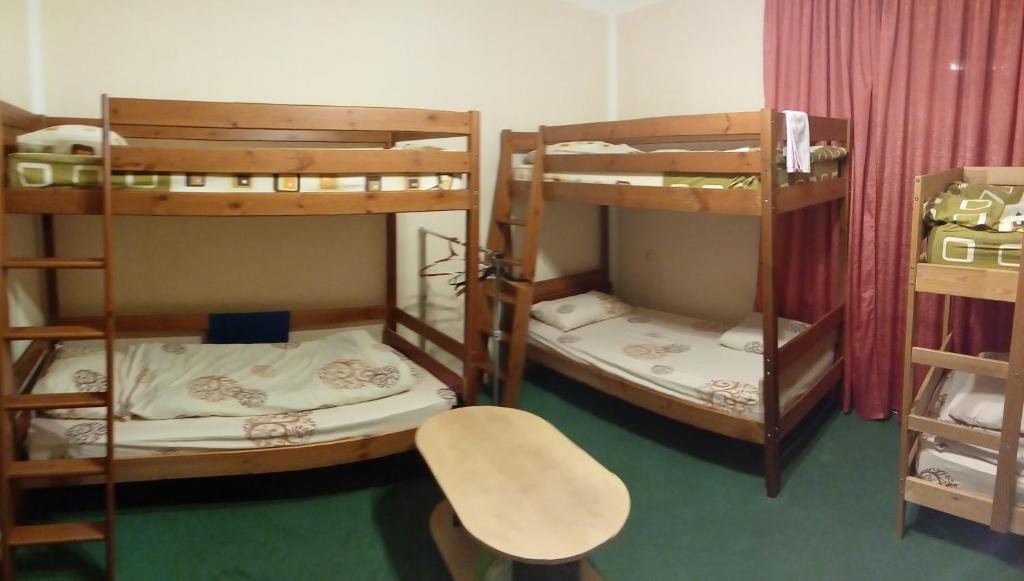 Двухъярусная кровать или двухъярусные кровати в номере CITY Hostel KYIV
