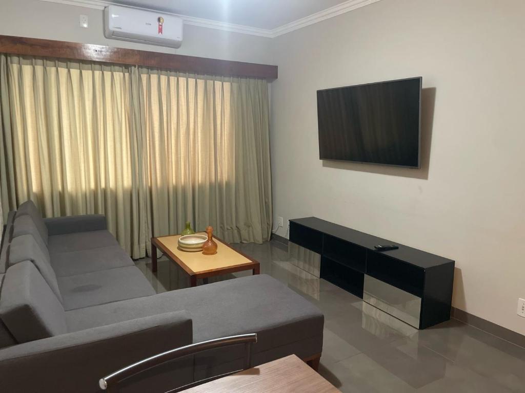 TV a/nebo společenská místnost v ubytování Plaza Flat C/ Serviço De Quarto