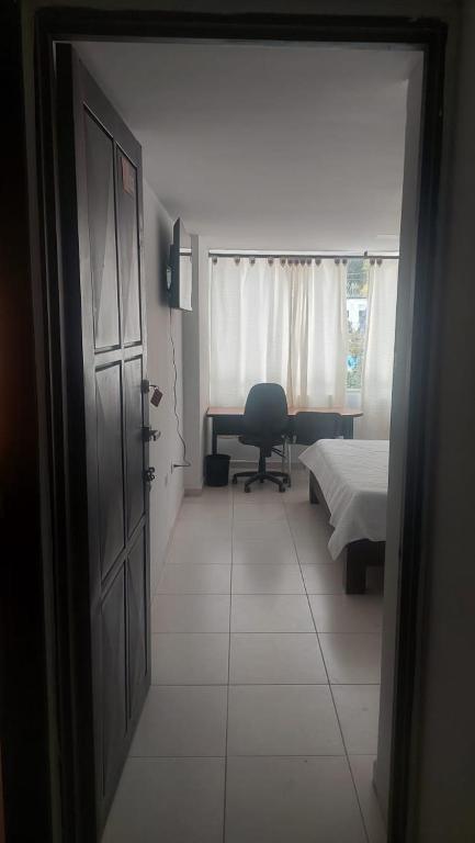 TV a/nebo společenská místnost v ubytování HOTEL MALU REAL POPAYAN Cauca