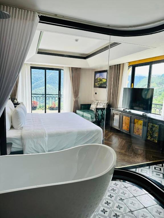 Postel nebo postele na pokoji v ubytování Fansipan View Hotel