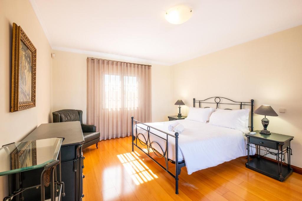 Postel nebo postele na pokoji v ubytování Casa Vela Palace