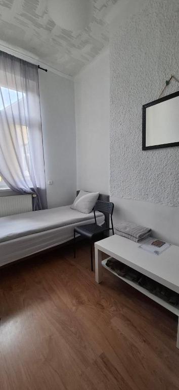 Postel nebo postele na pokoji v ubytování Serce Przemyśla