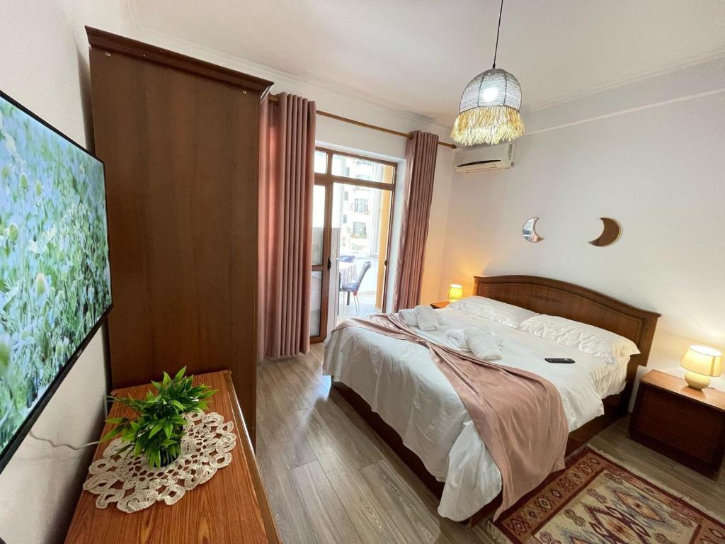 Ένα ή περισσότερα κρεβάτια σε δωμάτιο στο Studio Place Square 21