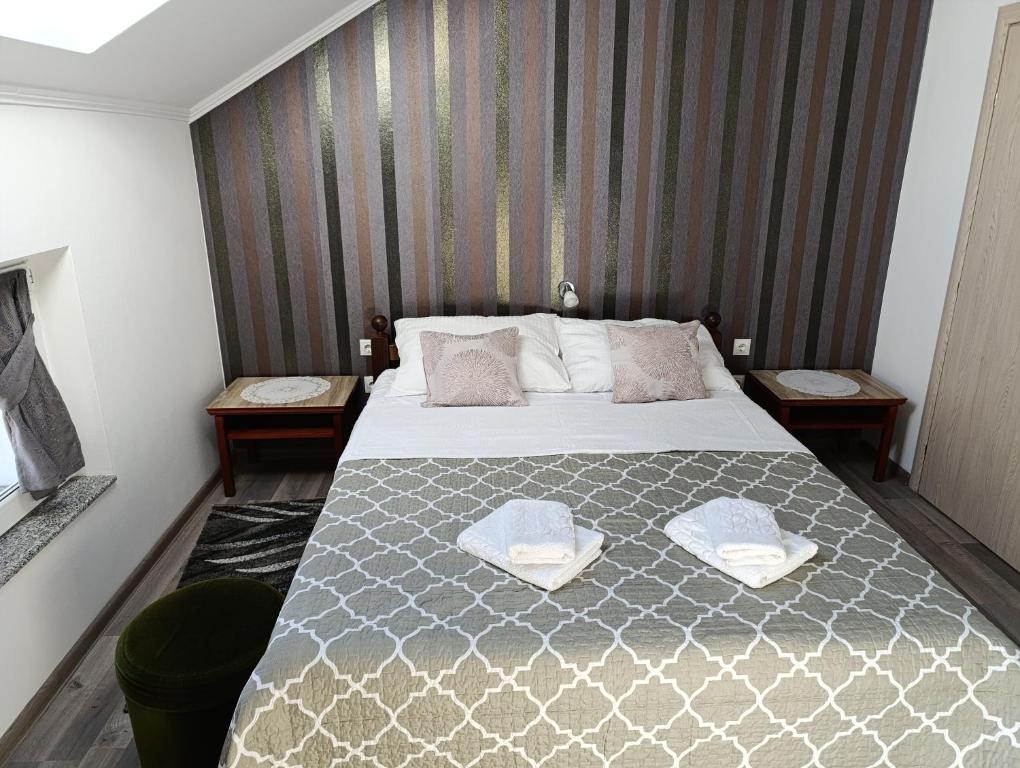 Posteľ alebo postele v izbe v ubytovaní Guest House Toic