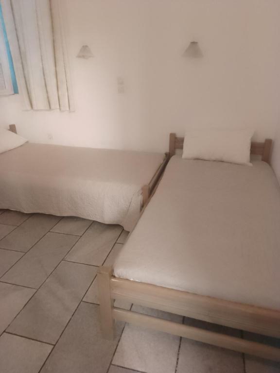 Postel nebo postele na pokoji v ubytování villa polemis