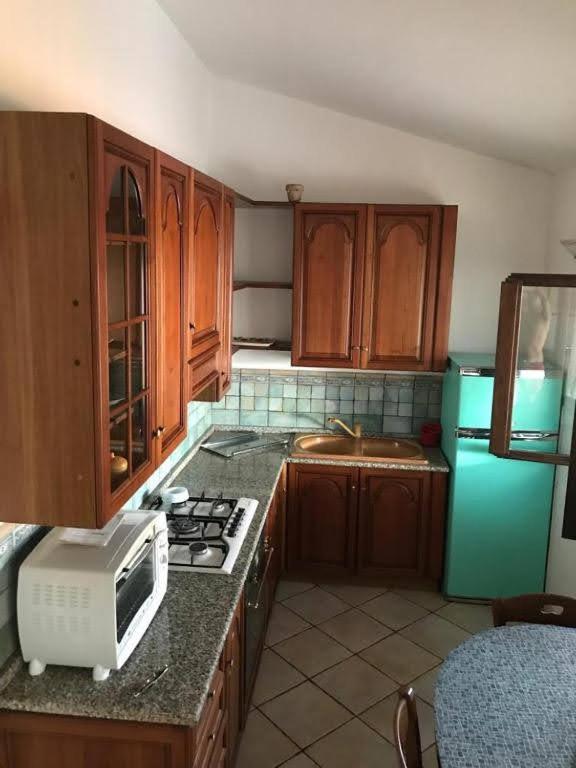 Kuchyň nebo kuchyňský kout v ubytování Le Case di San Teodoro