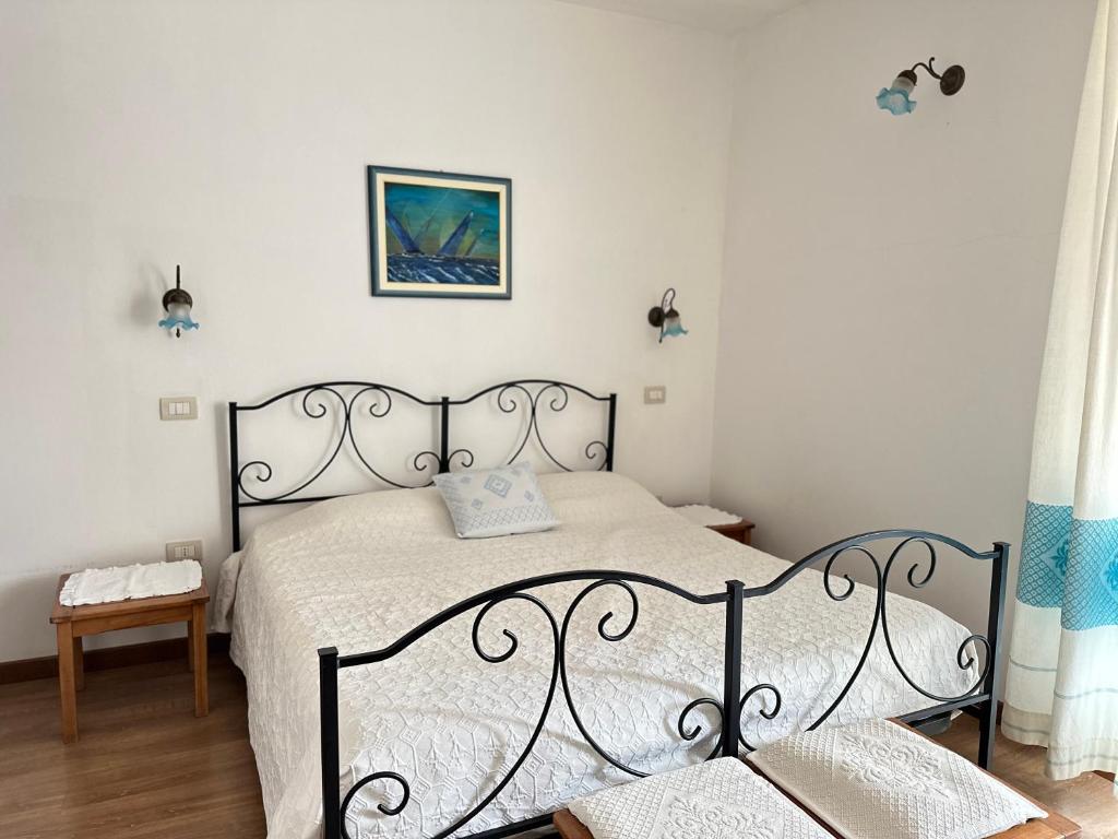 Postel nebo postele na pokoji v ubytování B&B Tre - Rooms & Relax