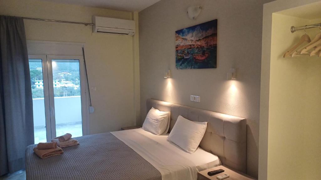 Postel nebo postele na pokoji v ubytování Villa Kavourakia