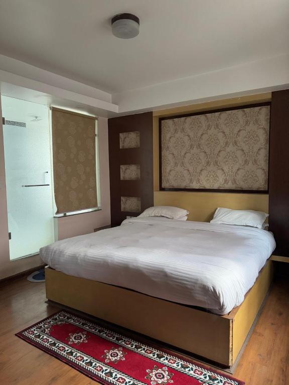 Postel nebo postele na pokoji v ubytování Cosy Stay & Dine