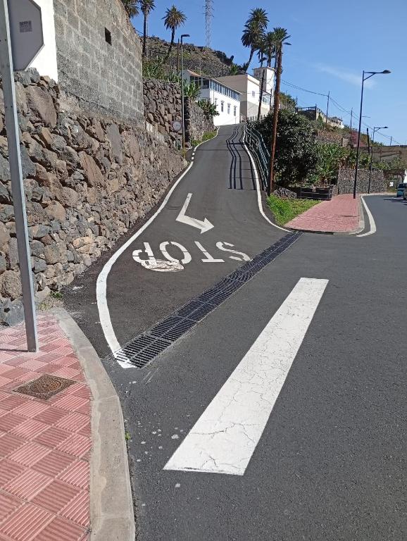 a road with a bike lane on the street at Casa Rural La Cuadra in Hermigua