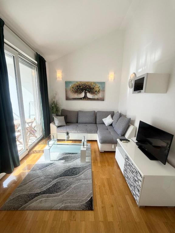 TV a/nebo společenská místnost v ubytování Apartment My Place