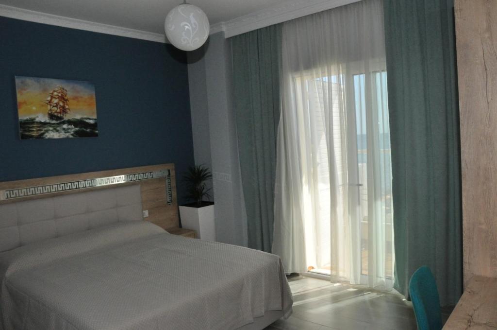 Postel nebo postele na pokoji v ubytování Hotel Maren Durres